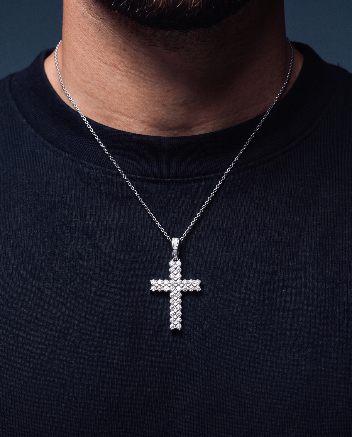 MOISSANITE PAVED CROSS PENDANT.